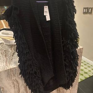 Brand new - never worn fluffy sweater vest.